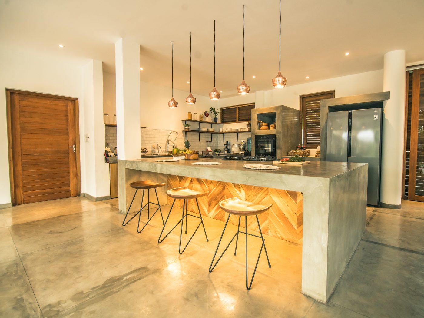 The open kitchen where guests watch the chefs cook dinner